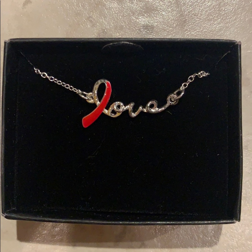 Avon silver love necklace